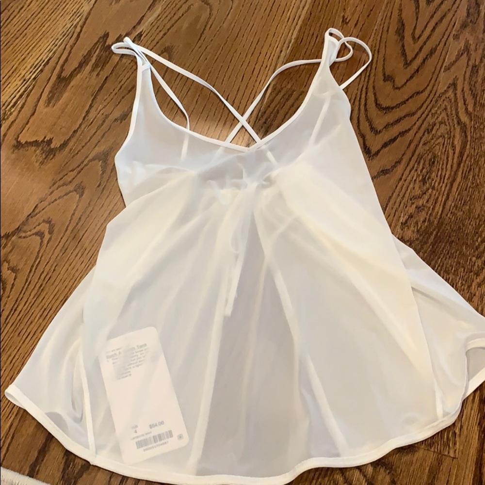 White Lululemon sheer tank.